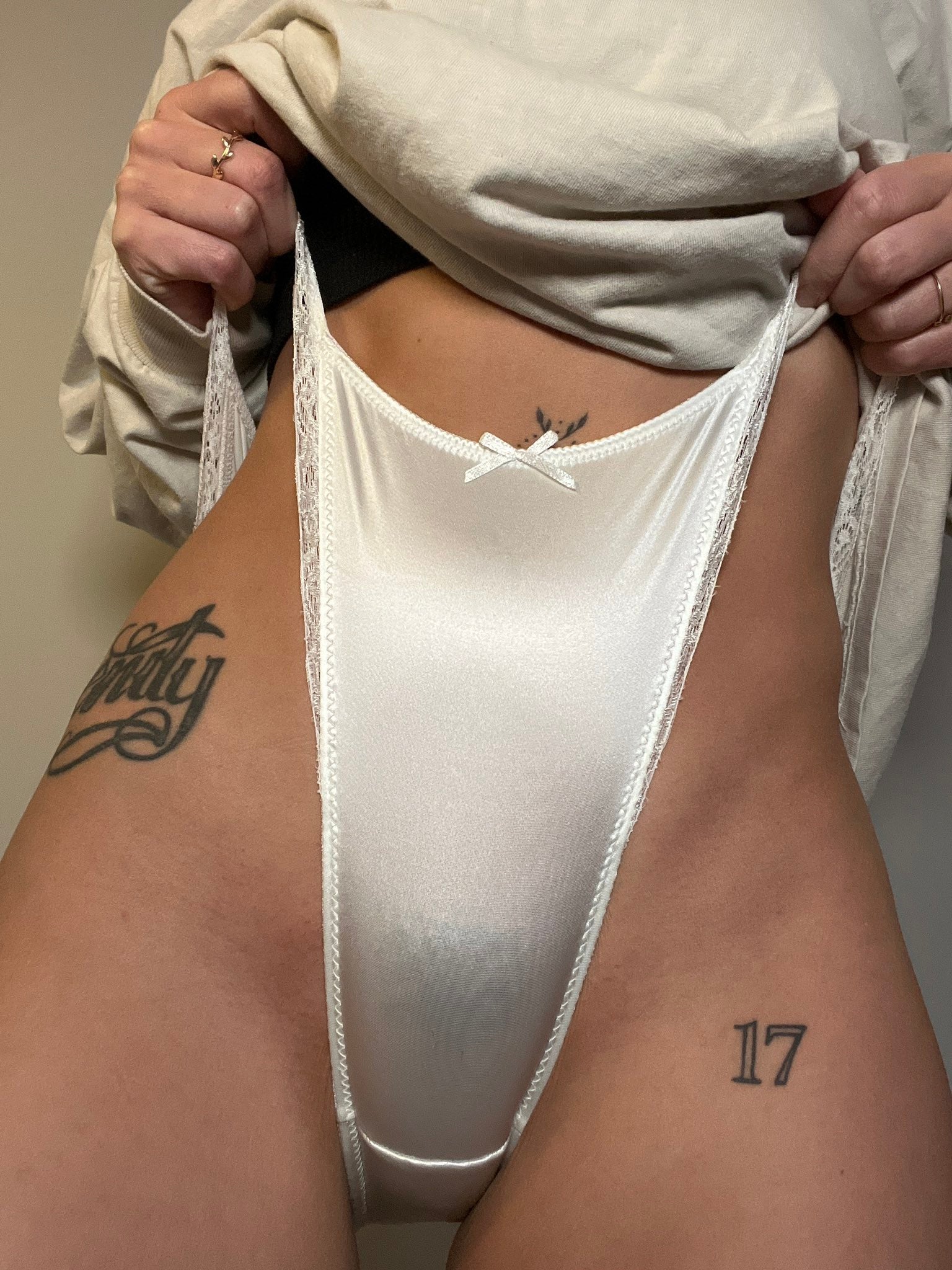 Pixie! Lily lace thong panties in white with center bow