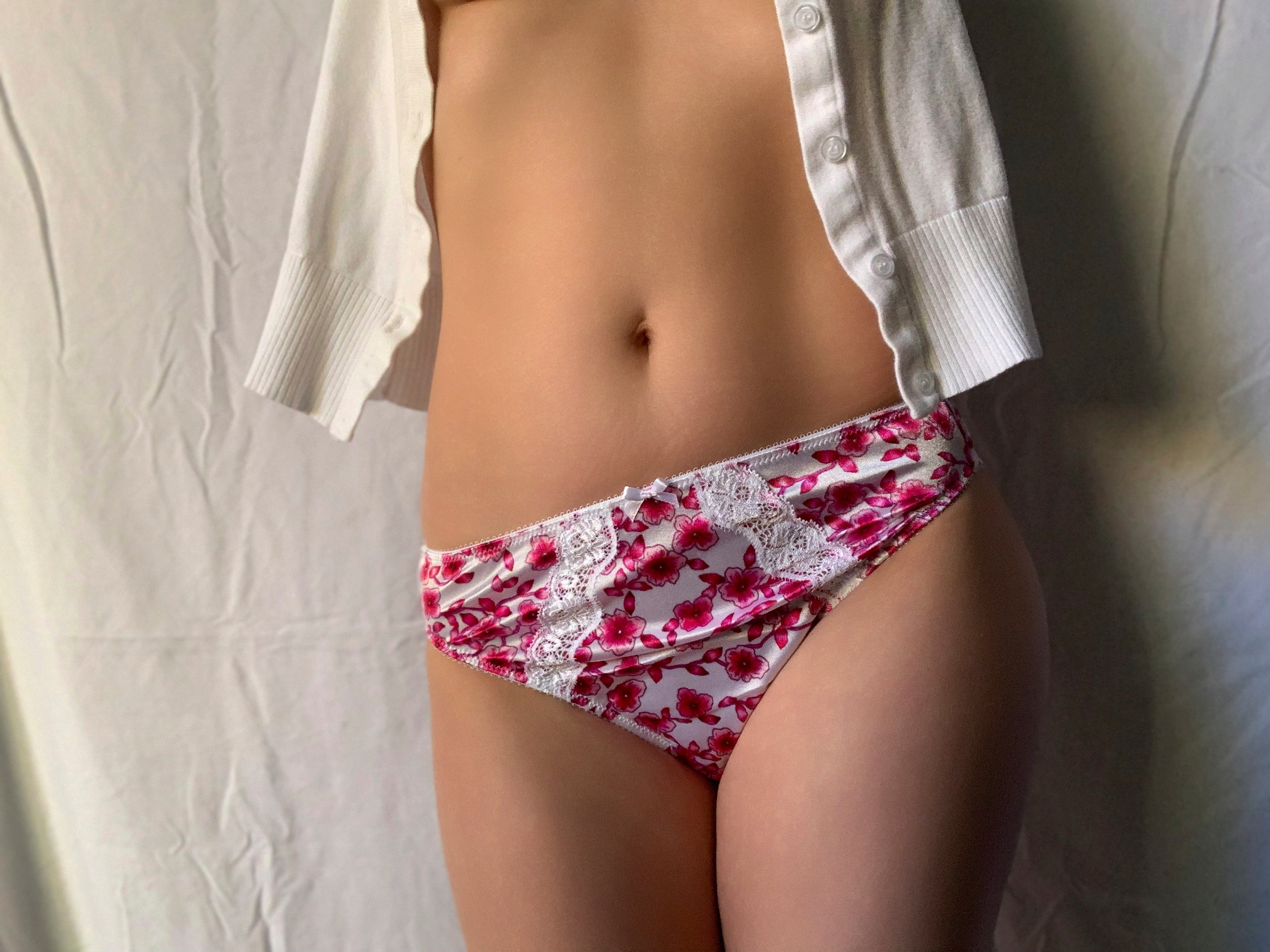 Floral bikini-style panty with hot pink flowers and white lace trim