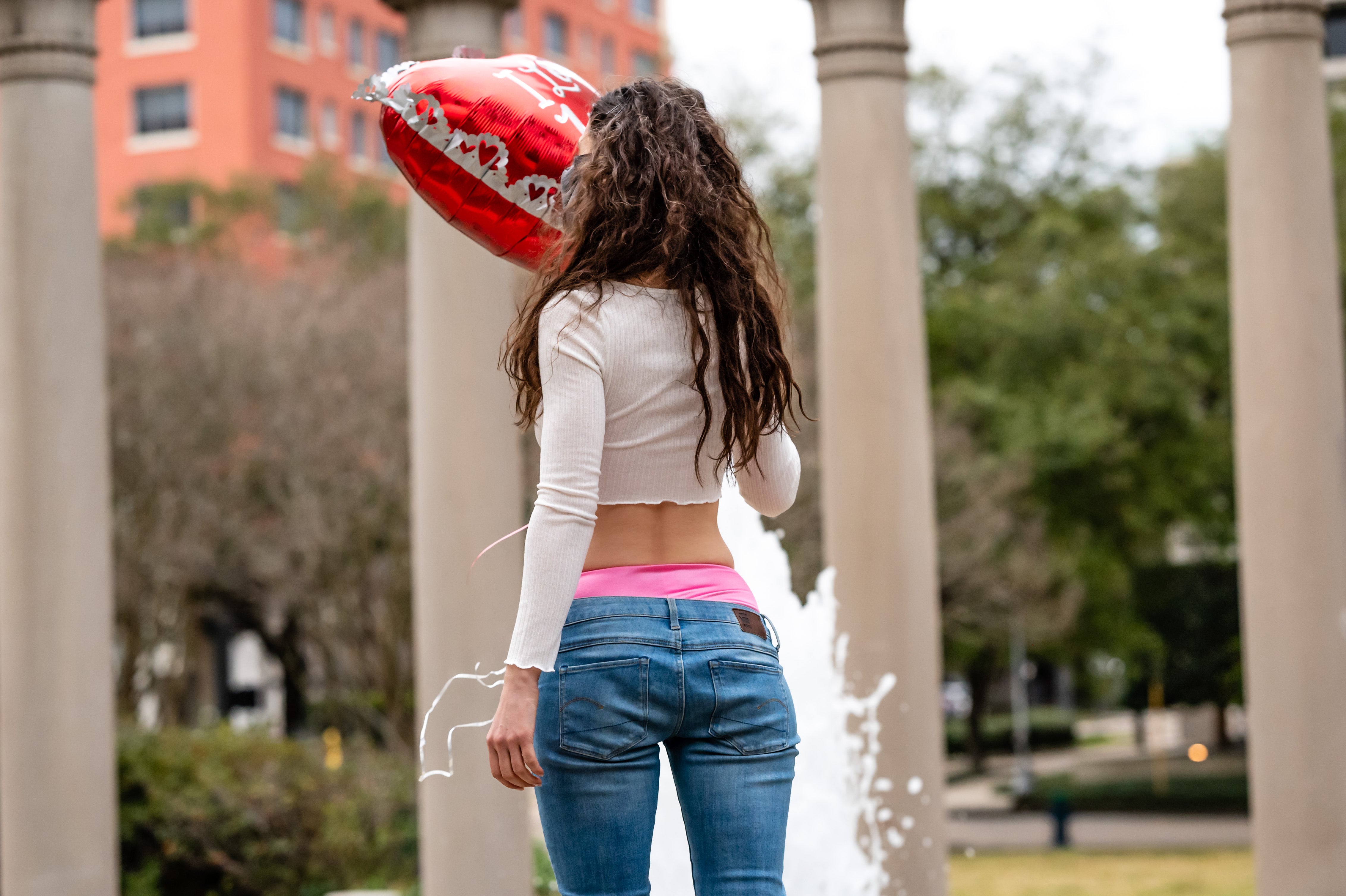 Hot pink panty with white lace waistband, viewed from back