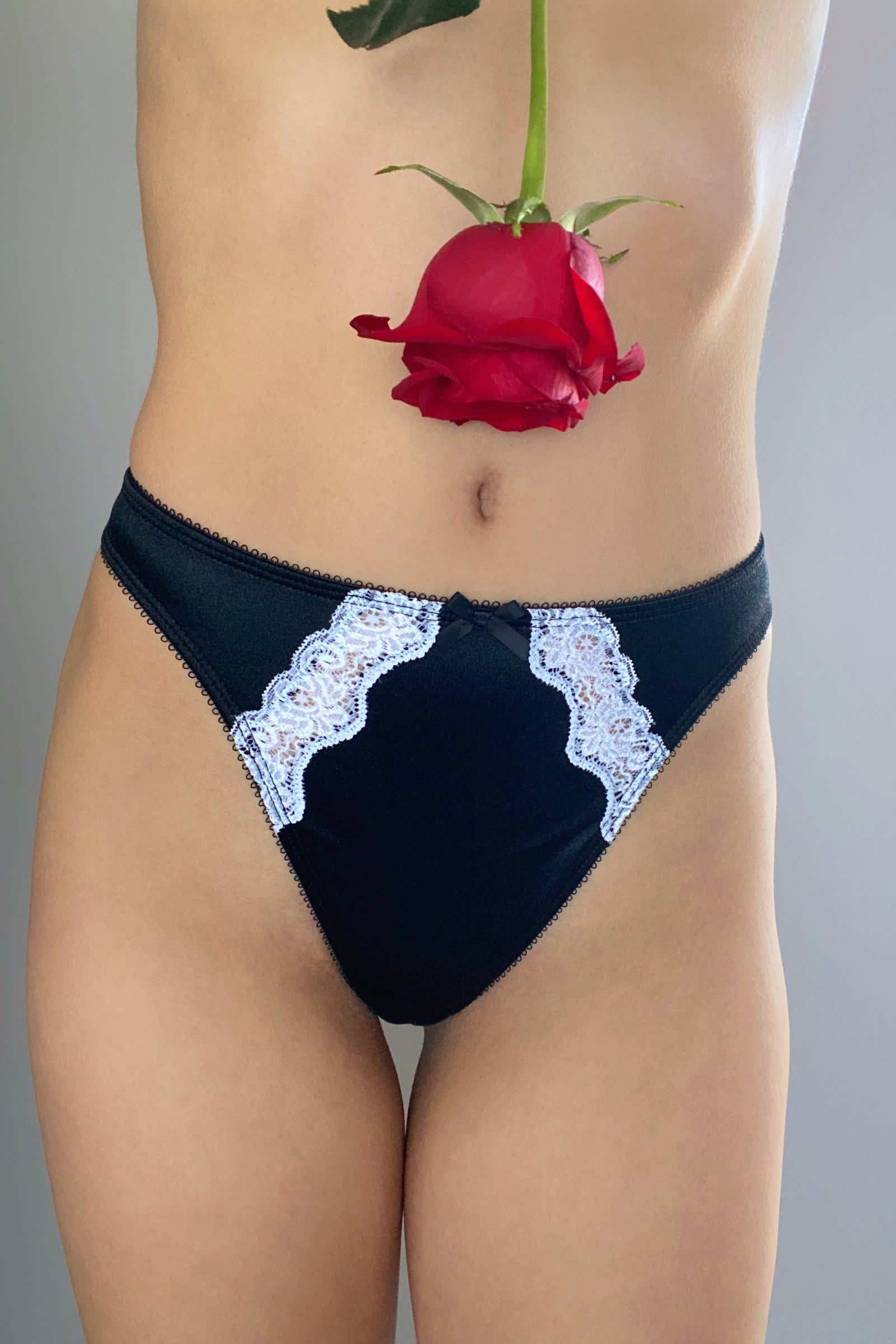 Midnight black thong panties with white lace scallops and center panel