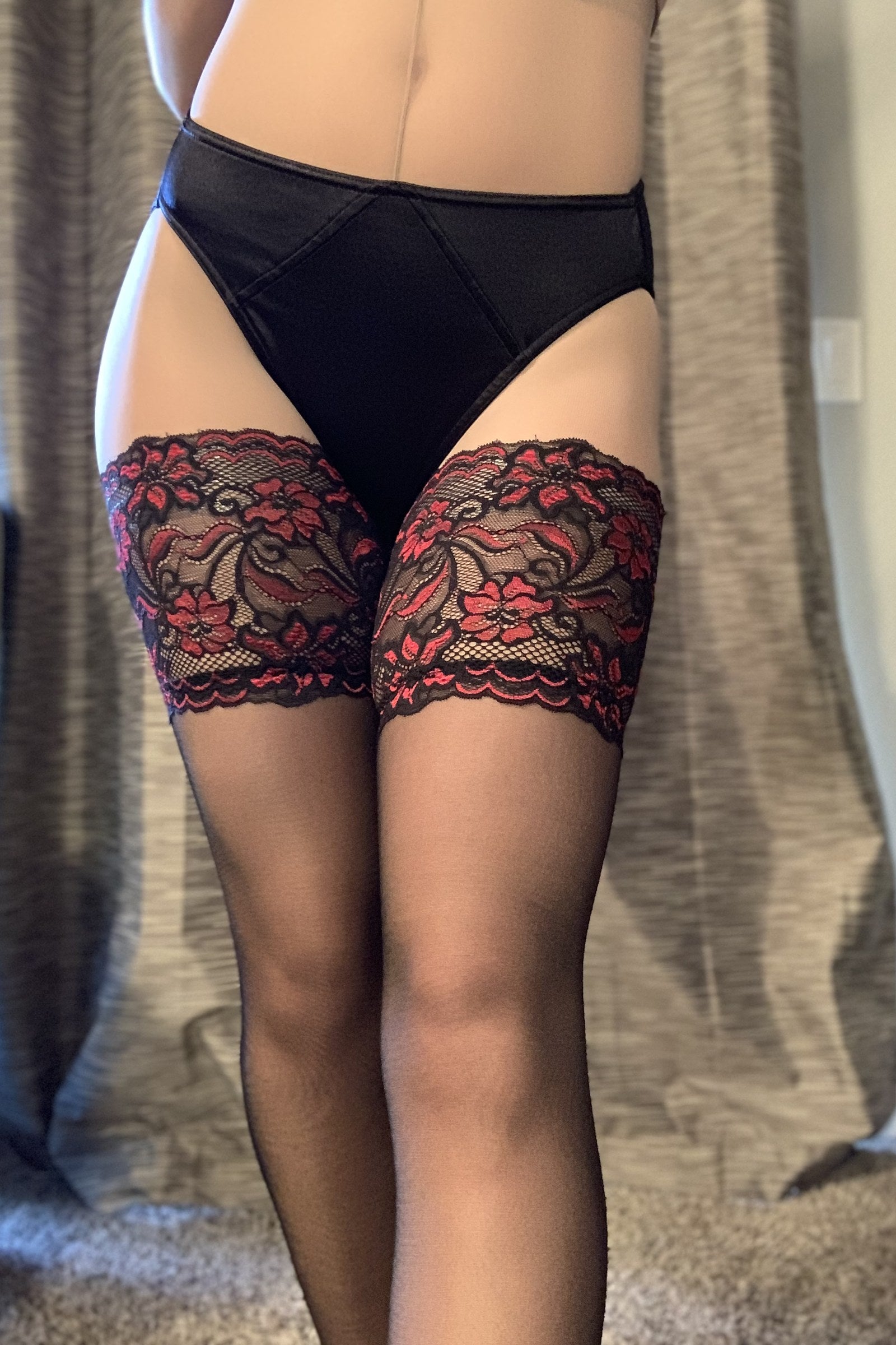 Midnight black hipster panty with floral lace garter cuffs on sheer stockings