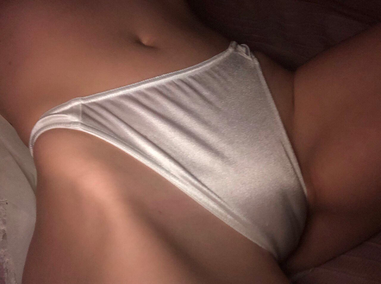 Shimmery satin thong panties with low-rise front and smooth waistband