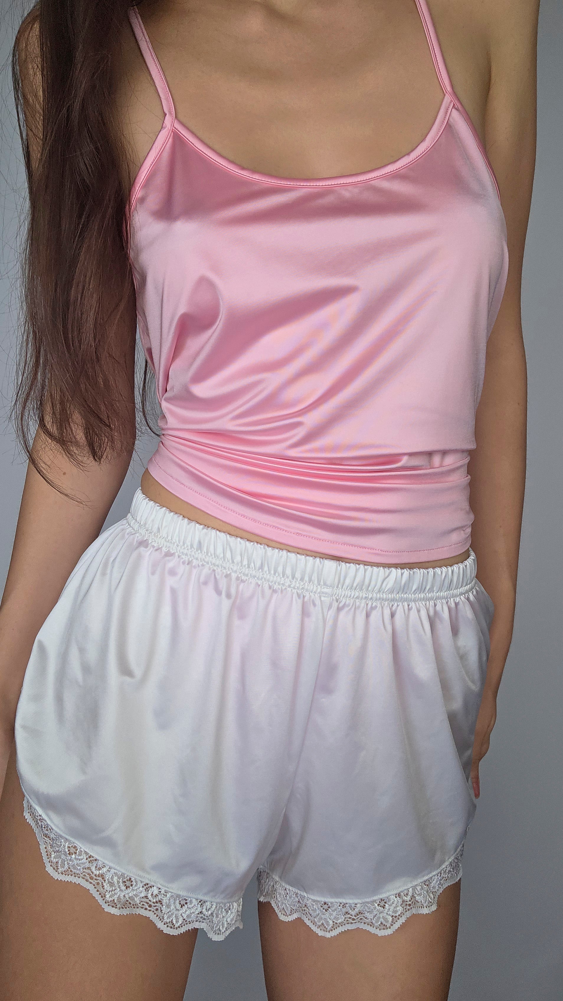 Pink satin camisole with white satin shorts, lace hem and elastic waistband